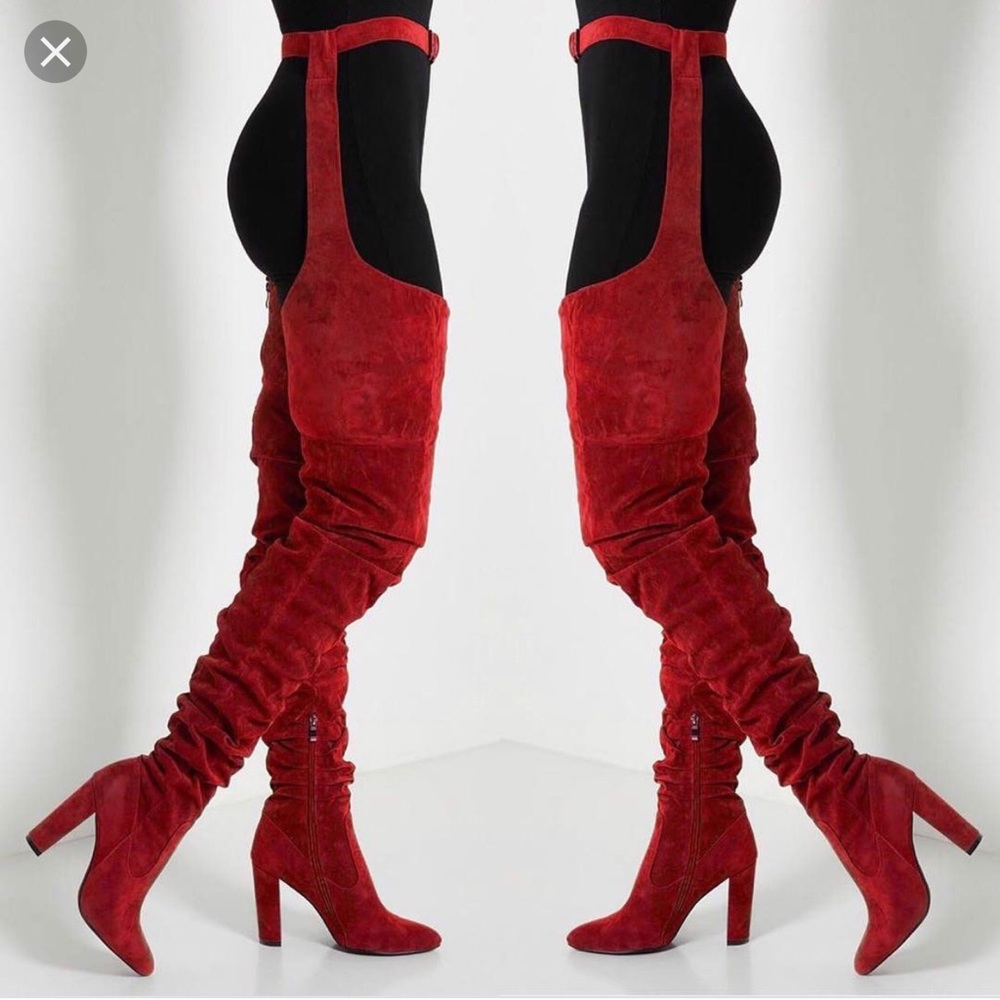 Thigh high belted boots